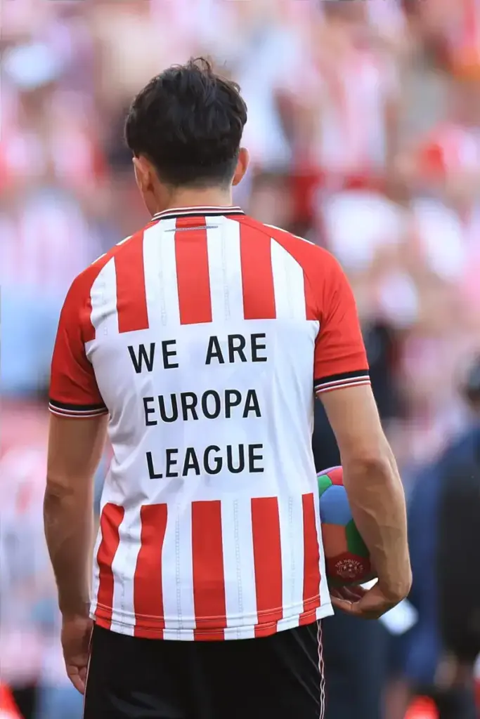 Luke O’Nien of Sunderland celebrates at full time with family as Sunderland qualify for the Europa League during the Premier League match at the Stadium of Light, Sunderland 24/05/2026
